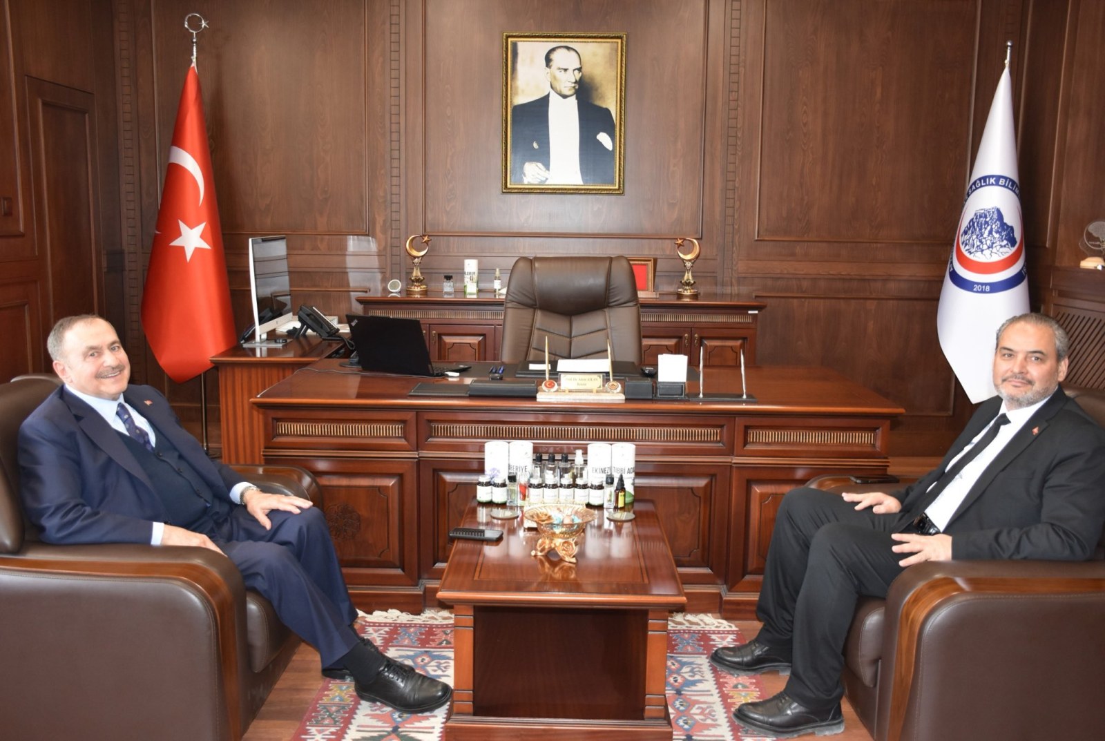 Eroğlu, AFSÜ'de Yöneticilerle Görüştü